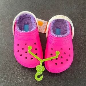 CROCS Kids Vibrant Pink Slippers with Cozy Purple Interior